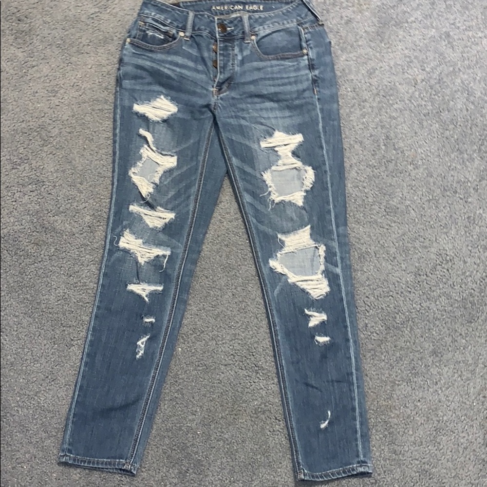 distressed tomgirl jeans
